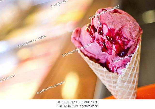 A Balsamic-Strawberry ice cream cone is seen at the 'Christina' ice cream parlour in Frankfurt/Main, Germany, 06 March 2015