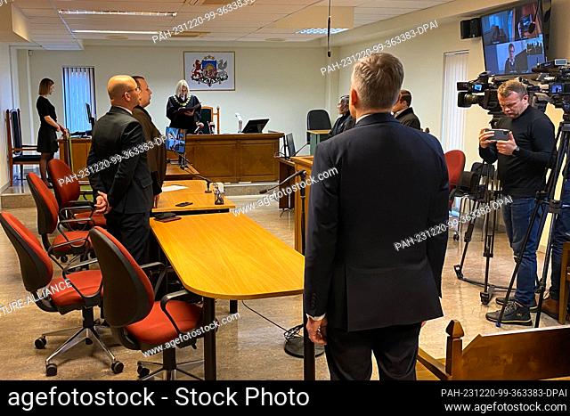 20 December 2023, Latvia, Jurmala: Latvia's former head of the central bank Ilmars Rimsevics (front M) follows the sentencing