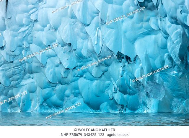Detail of an iceberg from the South Sawyer Glacier floating in Tracy Arm, a fjord in Alaska near Juneau, Tongass National Forest, Alaska, USA