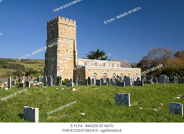 Church and graveyard in sunshine, St Nicholas Church, Abbotsbury, Dorset, England, october