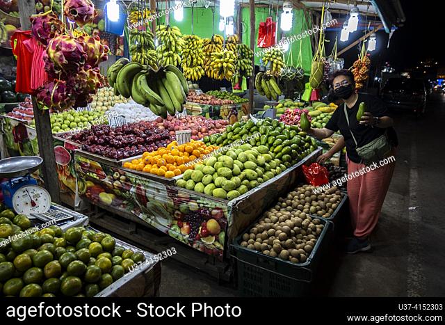 Roadside fruits stall in Singkawang, West Kalimantan, Indonesia, Borneo  A roadside fruits stall in Singkawang, West Kalimantan, Indonesia, Borneo