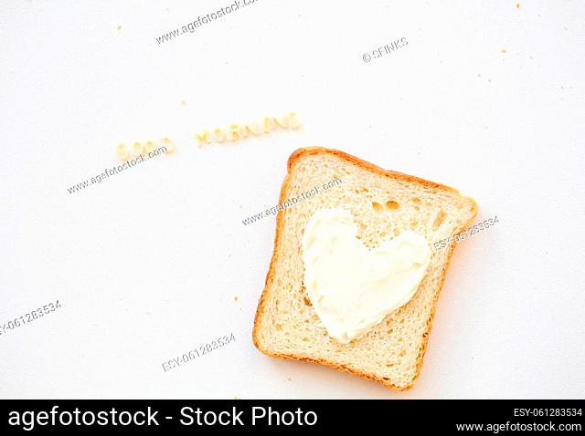 sandwich for breakfast in the form of heart with cheese - good morning inscription