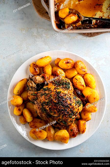 Roast chicken with potatoes. High quality photo