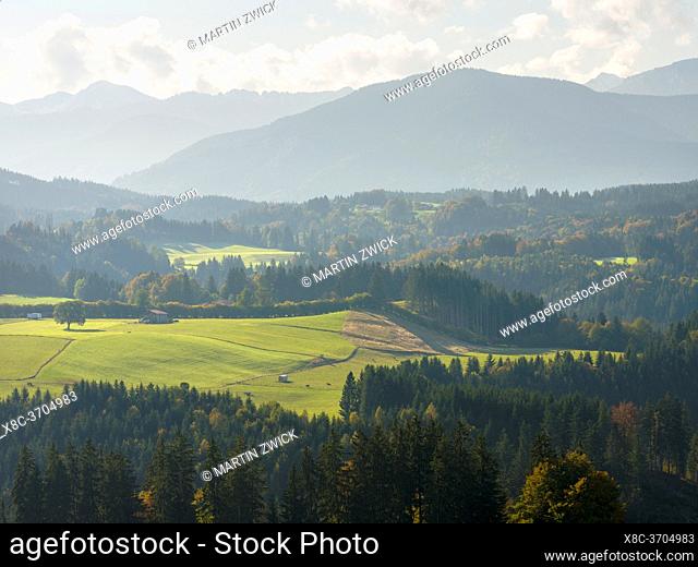 Landscape in the foothills of the Bavarian Alps, view towards the Ammergau Alps (Ammergauer Alpen). Europe, Germany, Bavaria