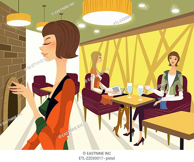 Three women in a restaurant