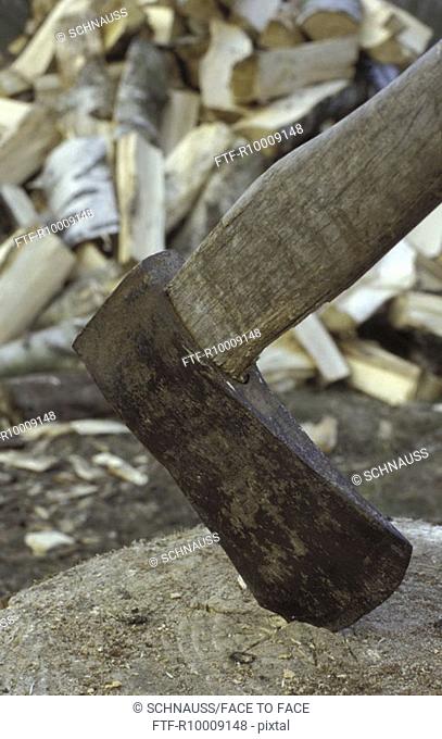 Axe in a block of wood