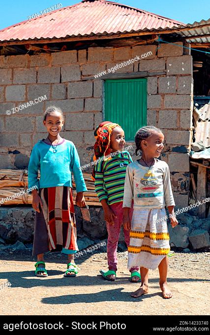 Debre Libanos, Ethiopia - April 19, 2019: Group of children on the street behind famous Monastery Debre Libanos, Ethiopia Africa