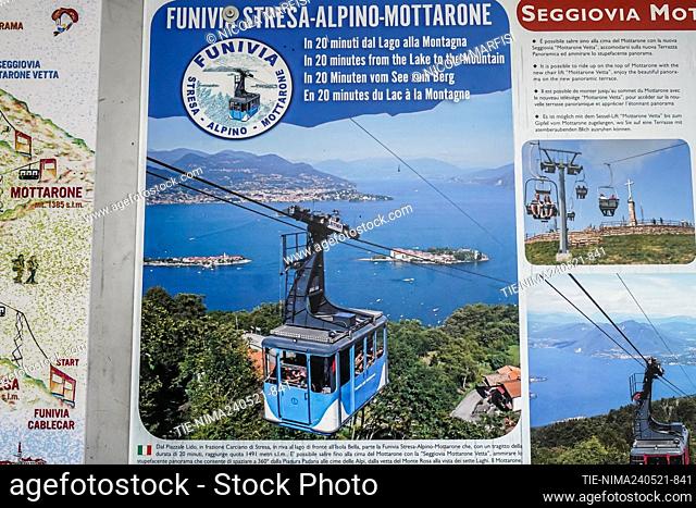 Tourist posters of the cable car. A cabin of the cable car for Mottarone just reopened after the lockdown crashed, 14 dead , Stresa, ITALY-24-05-2021