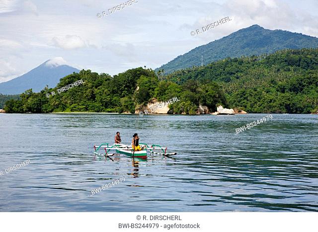 , fishermen in an outrigger boat in Lembeh Strait, North-Sulawesi, Indonesia, Sulawesi Utara
