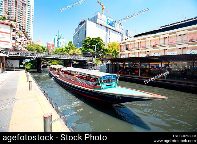 Bangkok, Thailand - April 21 2018: Boat travel in the canals of Bangkok on a hot sunny day