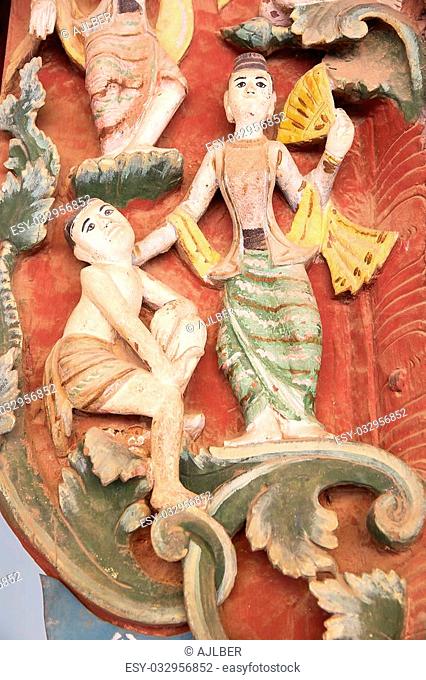 Details of the wooden bas-relief in one small temple at the Shwezigon Pagoda, Nyaung U village, Bagan, Myanmar. Shwezigon Pagoda is a Buddhist temple ubicated...