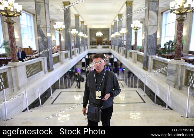 RUSSIA, MOSCOW - OCTOBER 23, 2023: A man ascends the Marble Staircase at the Russian State Library. Sergei Bobylev/TASS