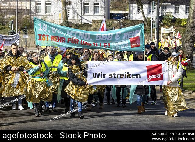 15 March 2023, North Rhine-Westphalia, Gelsenkirchen: The strikers' demonstration marches from Buer town hall to Bergmannsheil hospital in Gelsenkirchen