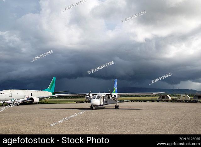 Honiara, Solomon Islands - May 27, 2015: Small propeller plane parked at the airport