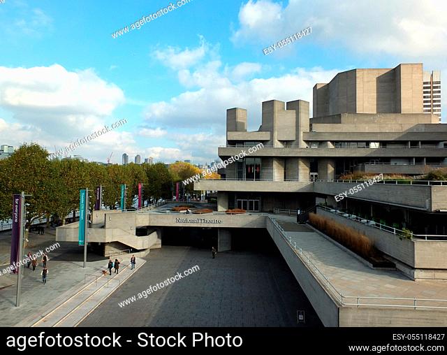 London, England - November 04, 2017: People walking along the concourse of the royal national theatre in London and on the pedestrian south bank of the river...