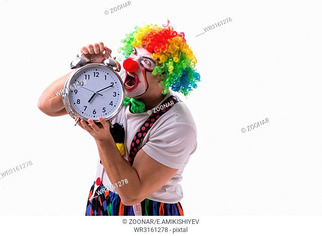 Funny clown with an alarm clock isolated on white background
