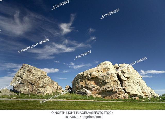 Canada, Alberta, Okotoks. Okotoks Erratic. is a 16, 500-tonne pair of boulders that lie on the otherwise flat, mostly featureless, Canadian Prairies