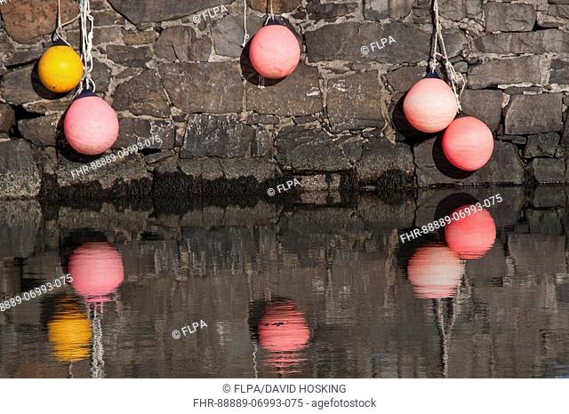 Buoy's hanging on Pier at Craighouse on the isle of Jura