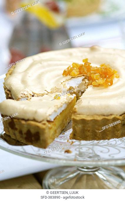 Lemon tart with a meringue topping and candided ginger