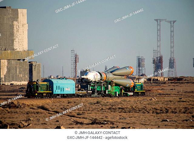 The Soyuz MS-04 spacecraft is rolled out to the launch pad by train on Sunday, April 16, 2017 at the Baikonur Cosmodrome in Kazakhstan