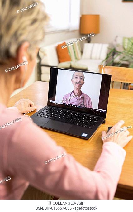 Senior woman teleconsulting from home