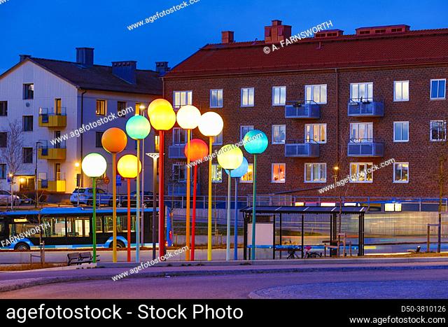 Halmstad, Sweden, The modern travel center and main bus stop in the center of town, and a pin sculpture that represents pins on a map