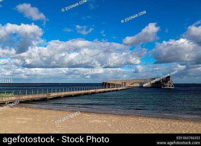 Copenhagen, Denmark - October 03, 2018: Kastrup Sea Bath, a circular wooden structure with seating around a seawater pool