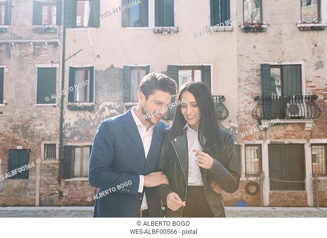 Italy, Venice, happy affectionate couple in the city