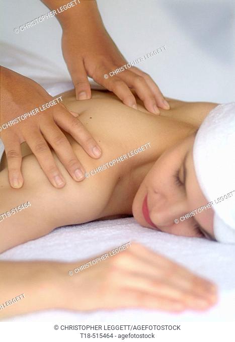 Lady enjoying therapeutic massage