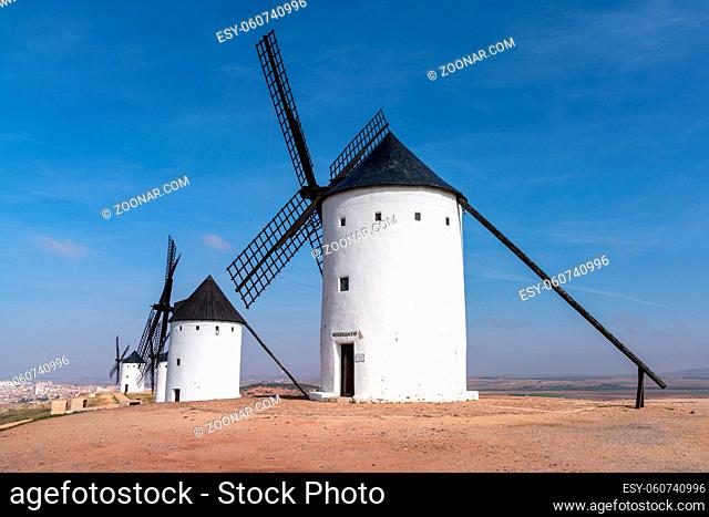 View of the historic the windmills of La Mancha in the hills above San Juan de Alcazar