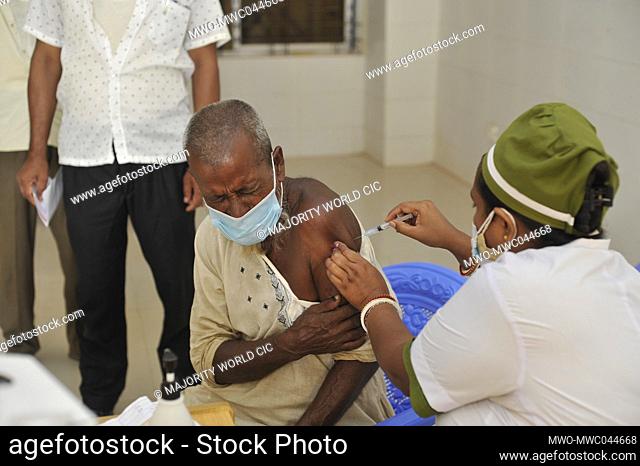 Medical staff prepare a dose of the Sinopharm Covid-19 Vaccine at the M A G Osmani medical college & hospital vaccination center in Sylhet, Bangladesh