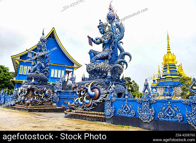 Blue statue at the Blue Temple (Wat Rong Suea Ten or Temple of the Dancing Tiger) in Chiang Rai, Thailand, Asia. Blue is symbolically associated with purity