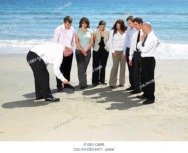 Group of businesspeople on the beach