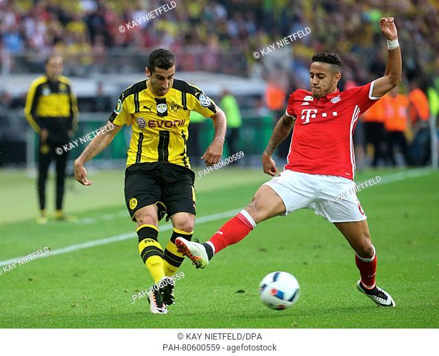 Dortmund's Henrikh Mkhitaryan (L) and Munich's Thiago Alcantara vie for the ball during the German DFB Cup final soccer match between Bayern Munich and Borussia...