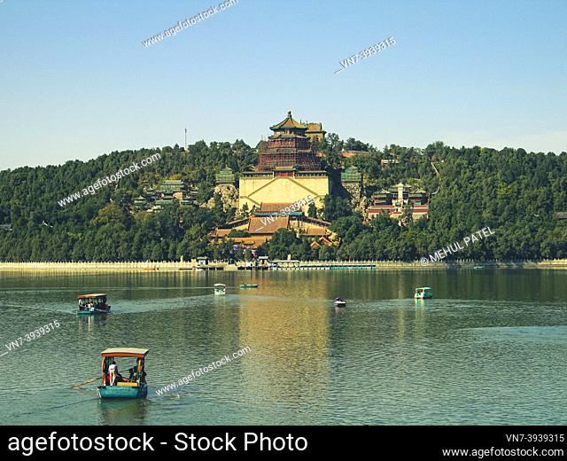 Boating on the Kunming lake of the Summer Palace park in Beijing, China. Summer Palace is a large and grand royal park, over 70, 000 square metres