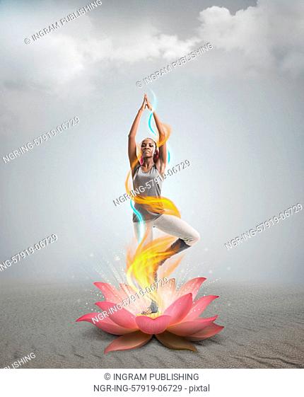 Silhouette young african woman practicing yoga in lotus flower