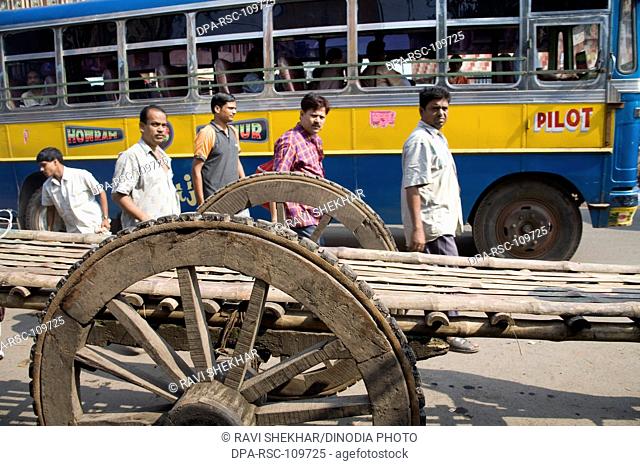 Street Scene ; local transportation ; Calcutta Kolkata ; West Bengal ; India