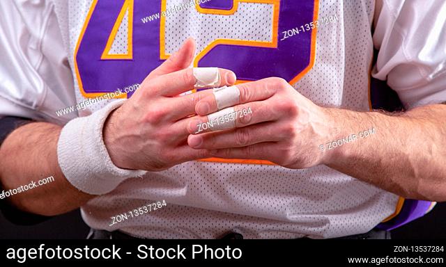 Taped fingers Of American footballer