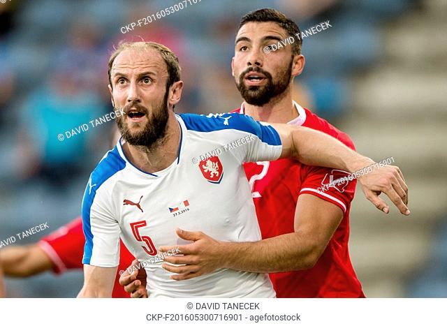 Zach Muscat of Malta, right, and Roman Hubnik, left, of Czech Republic in action during a friendly soccer match between Czech Republic and Malta in Kufstein