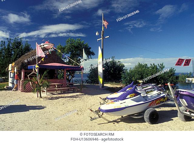 Florida Keys, Key Largo, FL, Gulf of Mexico, Florida, Atlantic Ocean, Jet skis outside the boat rental pink hut in Key Largo