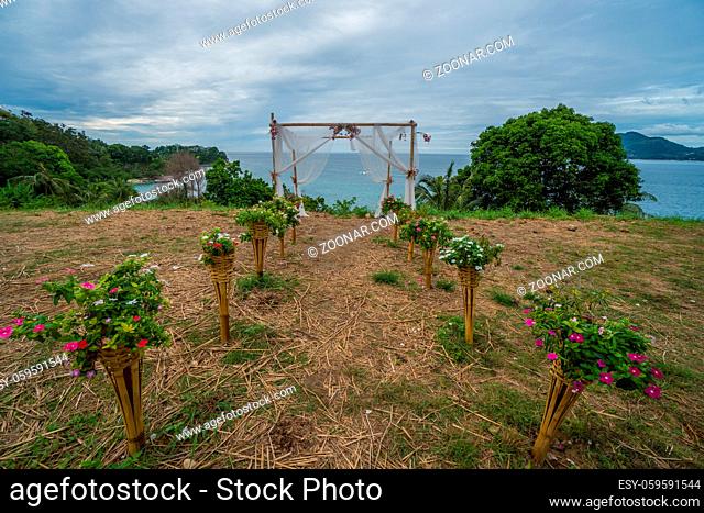 Rustic wedding aisle with sea and sky view background