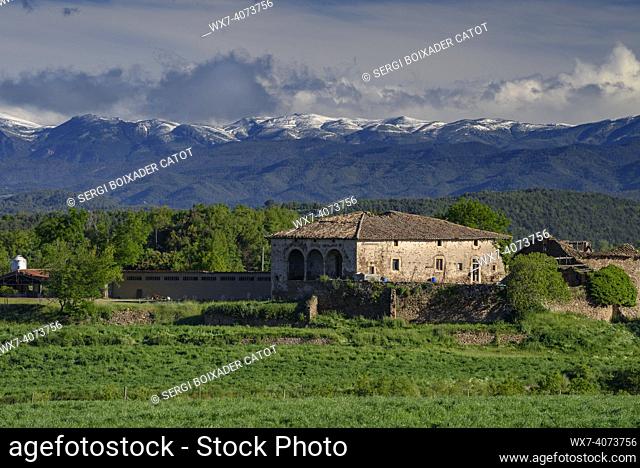 Views from the village of Sant Bartomeu del Grau in spring, with the Pyrenees in the background (Barcelona, Catalonia, Spain)
