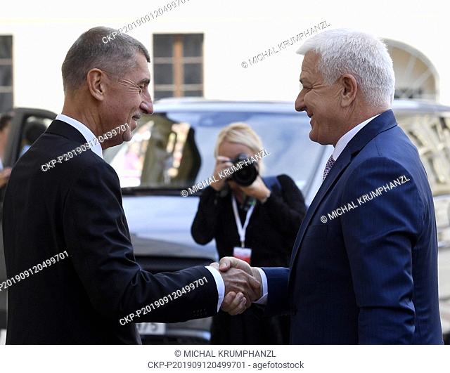 Czech Prime Minister Andrej Babis, left, handshakes with Prime Minister of Montenegro Dusko Markovic prior to meeting with PMs of Visegrad Four (V4; Czech...