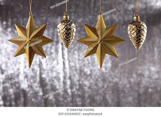 A group of Christmas Pine Cone And star