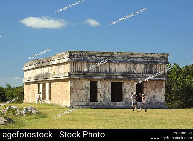 Visitors in front of the House Of The Turtles at the Prehispanic Mayan Archaeological Site Uxmal in the Puuc Route, Merida, Yucatan State, Mexico