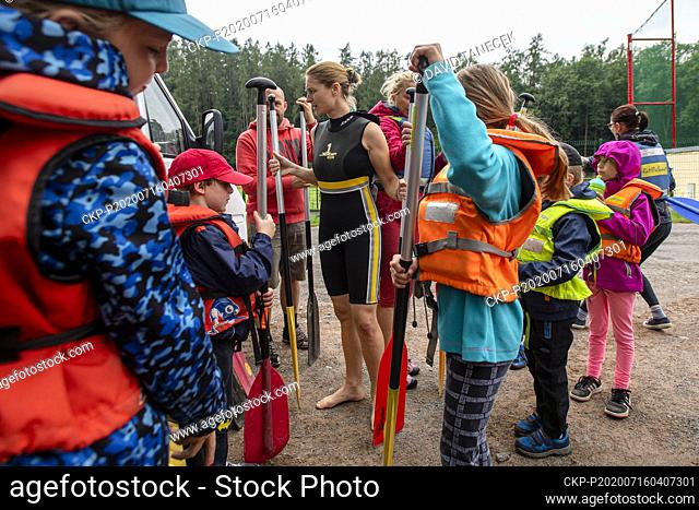 Water tourists are seen near the Orlice river in Kostelec nad Orlici, Czech Republic, on July 16, 2020. (CTK Photo/David Tanecek)
