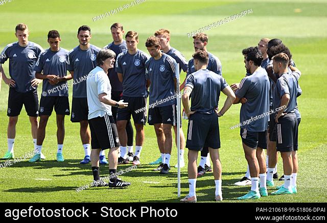18 June 2021, Herzogenaurach: Coach Joachim Löw addresses his players during Germany's final training session before facing Portugal on the second day of the...