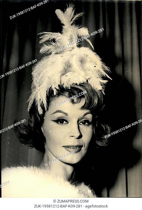 Dec. 12, 1958 - French hair-style for Christmas : French hair dresser Fernande Aubry presented his last creations for Christmas in Paris to-day