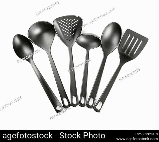 Black plastic kitchen cooking utensils isolated on white