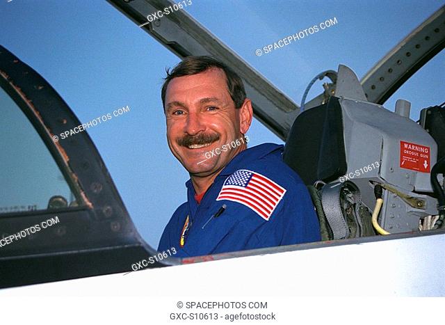 07/20/1997 --- STS-85 Mission Commander Curtis L. Brown, Jr., poses in his T-38 jet trainer after landing with his crew at KSC’s Shuttle Landing Facility from...